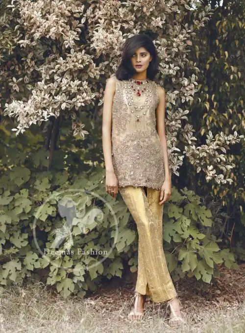 Beige and Golden Straight short shirt.has a large embroidered border implemented at the bottom of the shirt. We can add