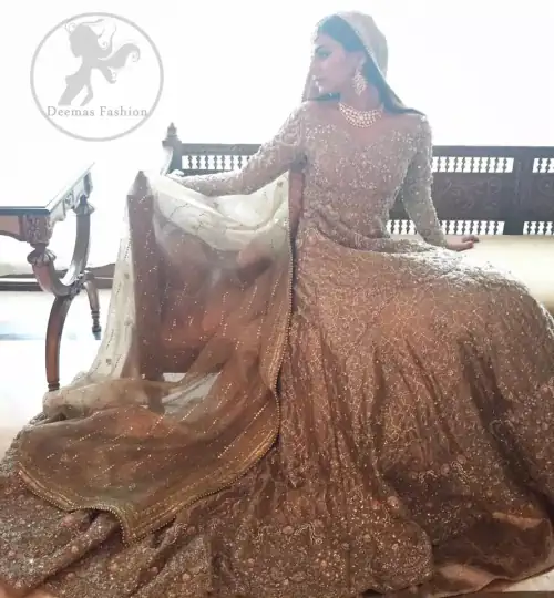 The frock has been adorned with a fully embroidered bodice. The frock features beautiful and fabulous embellishment front and back.