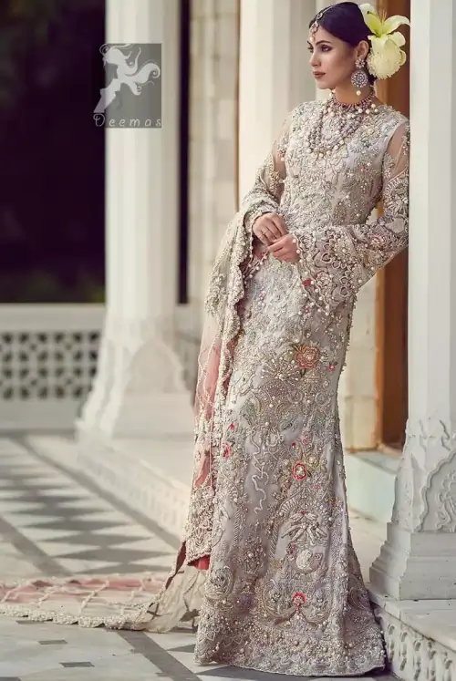 Ivory white long fitted bridal maxi. Maxi adorned with colorful embellishment using appliques and threads. Bridal maxi comes with two