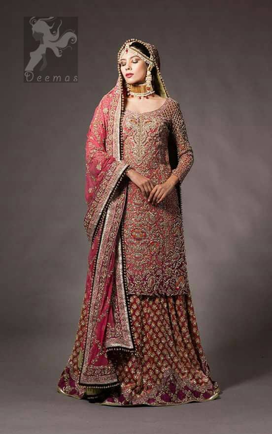 Tea rose fully embellished shirt with plum applique border on hemline. Plum dupatta adorned with tea rose and silver appliques having black finishing. Tea rose fully embellished lehenga with small motifs having plum applique border on hemline.