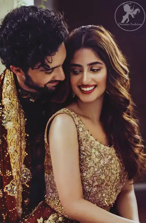 Frock having intricately embellished brown bodice and deep red frock embellished with tea pink, golden and brown shaded kora, dabka,