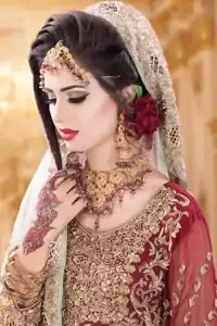 This outfit is meticulously highlighted with antique shaded kora, dabka, tilla, sequins and Swarovski. This dress is beautifully sculptured with floral embroidery. It is artistically coordinated with an embellished woody brown dupatta which has an embellished cutwork border. It is beautifully paired up with copper rust Gharara. It comes with a woody brown embellished dupatta.
