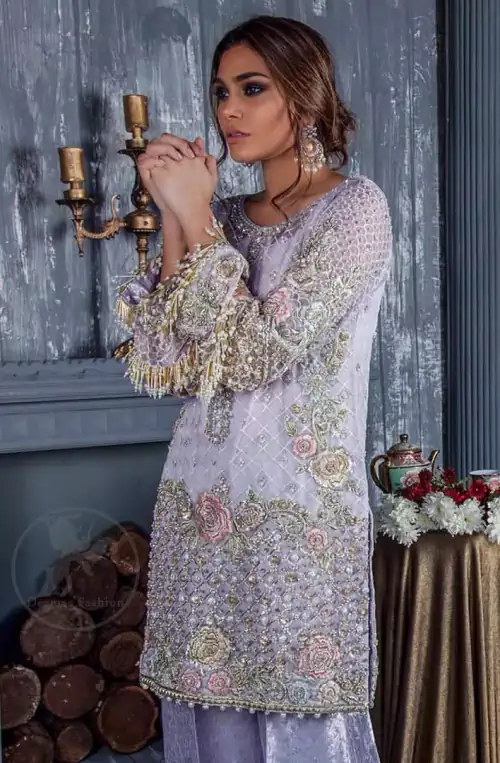 Standout in this gorgeous chiffon shirt embellished with tilla, kora dabka, sequins and pearls.It is further enhanced with floral thread