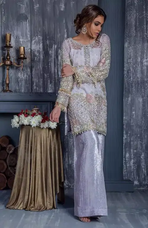 Standout in this gorgeous chiffon shirt embellished with tilla, kora dabka, sequins and pearls.It is further enhanced with floral thread