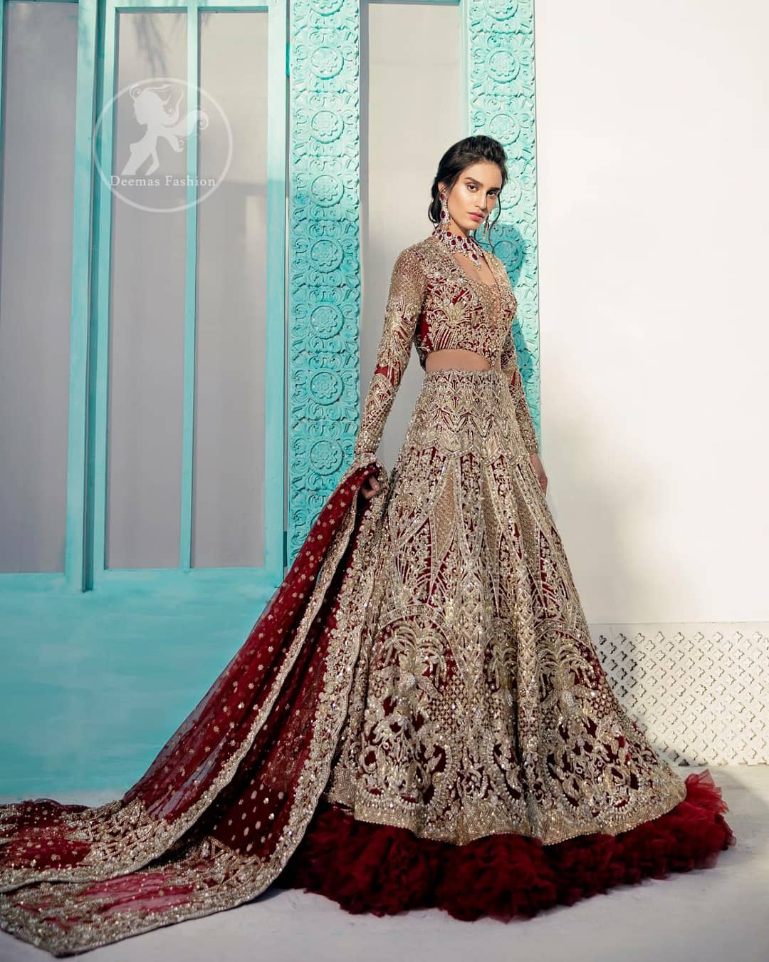 Heavy embellished bridal dress, with V Shaped blouse and skirt encrusted with swarovski stones, pearls, tilla and kora dabka along with a heavy embellished skin shawl. Beautifully paired up with deep red dupatta with sprinkled sequins and heavily embroidered borders. Best combo for a bridal.