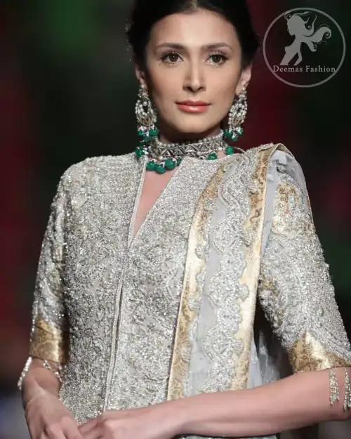 This dress is adorned with floral embroidery, highlighted with kora, dabka, tilla, sequins and pearls. It is allured with intricate