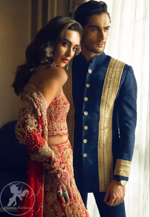 This bridal blouse executing heavily handcrafted art of zardozi. This dress is beautifully decorated with heavy embroidery. It is highlighted