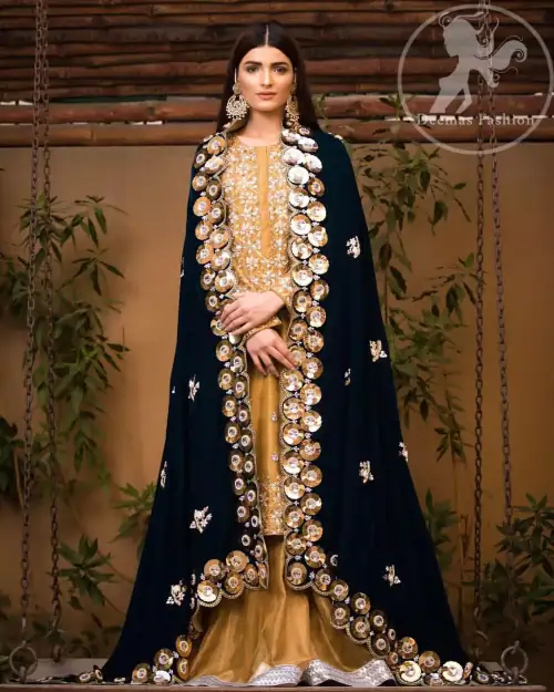 This dress is allured with floral embroidery. It is further enhanced with gota, kundan, sequins and pearls. It comes with