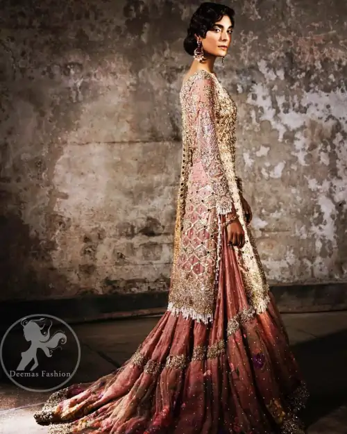 This bridal dress stands out due to its uniqueness and the perfect fusion of modern cut and traditional embroidery. It