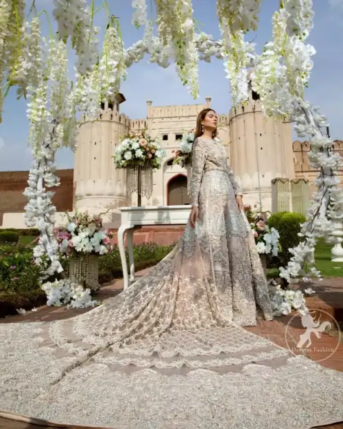 Reflecting exuberant color play in this ethereal piece meticulously highlighted with swarovski, pearl, silver kora and dabka. Heavily embellished in