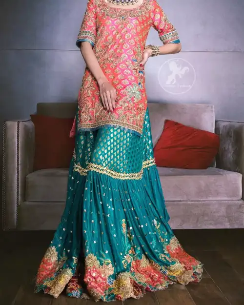 Our tea rose shirt with exquisite embellished neckline and back neckline in kora, dabka sequins and intricate thread work. The