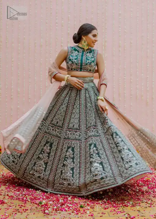 Bottle Green Velvet Blouse Lehenga Tan Dupatta. This dress is beautifully sculptured with floral embroidery, adorned with silver kora, dabka,