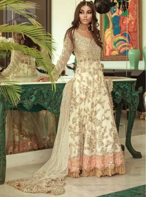 Reflecting exuberant color play in this ethereal piece meticulously highlighted with antique shaded kora, dabka, tilla and sequins. The frock