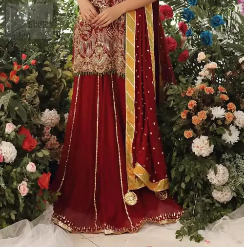 Tradition meets modernity. Boost your confidence and style in this glamorous attire accentuated with finest zardozi work embroidery and scalloped