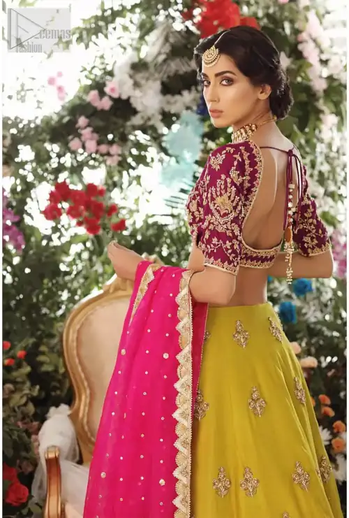 Adorn yourself with this breath-taking mehndi lehenga outfit. This beautiful mehndi dress comes with yellow lehenga with scattered beautiful embellished
