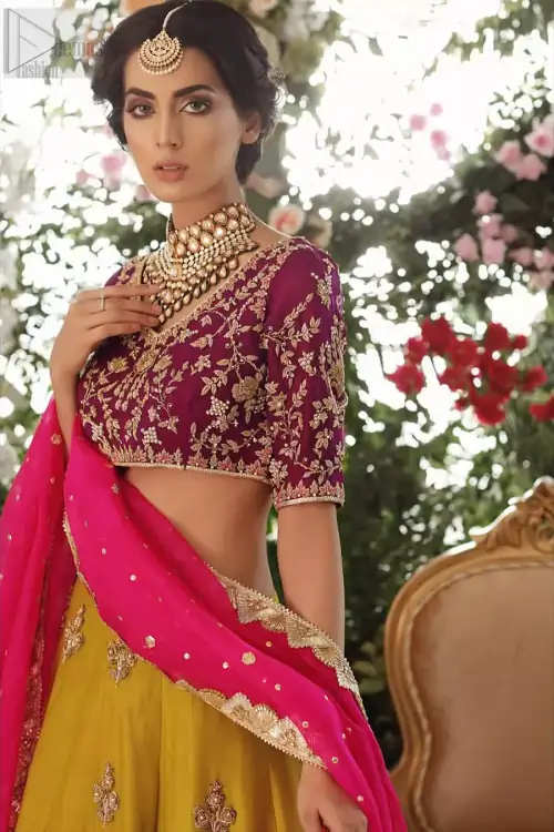Adorn yourself with this breath-taking mehndi lehenga outfit. This beautiful mehndi dress comes with yellow lehenga with scattered beautiful embellished