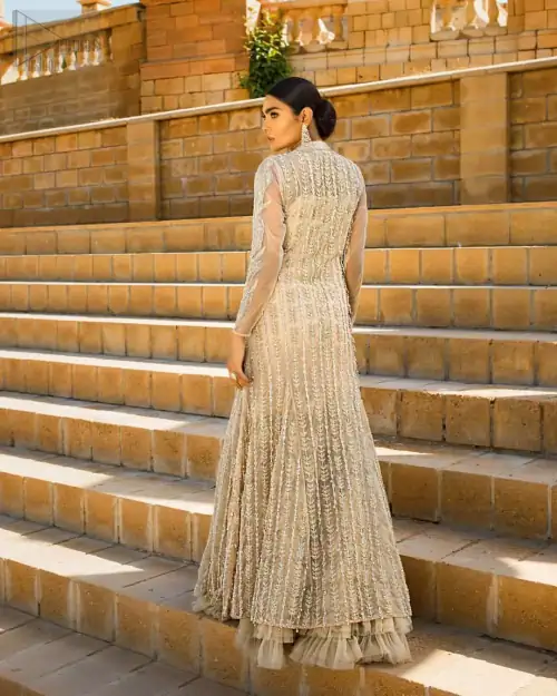 A fusion of traditional and latest fashion making the outfit trendy and unique. This angrakha style floor length maxi is