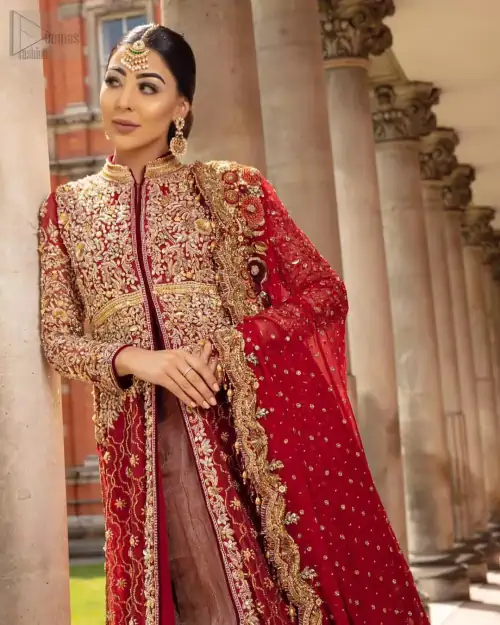 Crafted with love. Make your big day more beautiful with our excessively embroidered front open gown featuring delicately embellished neckline