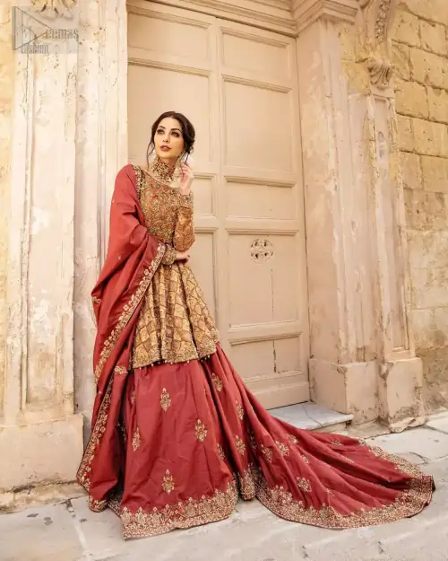 Chic and sophisticated perfectly describe this simply stunning wedding dress. This artisan piece includes intricate hand embellishment. This technique gives