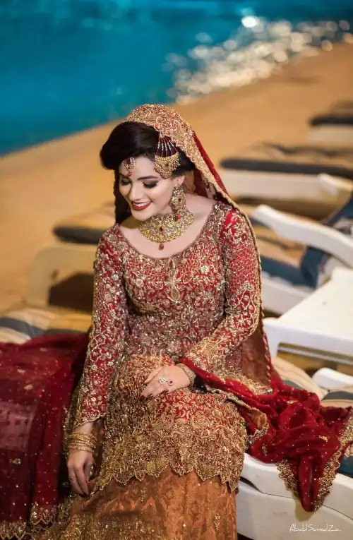 Pakistani Reception Wear - Maroon Shirt – Rust and Maroon Lehenga. You are all set to make a lasting impact