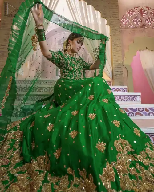 Nothing speaks of femininity and class louder than this green mehndi outfits for bridesmaids. This beautiful outfit comes with a