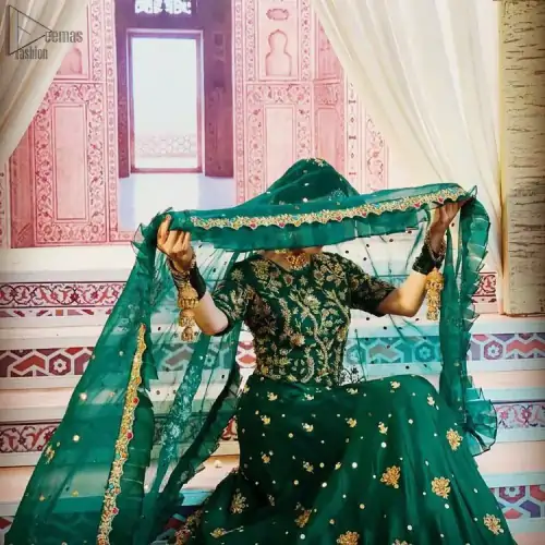 Nothing speaks of femininity and class louder than this green mehndi outfits for bridesmaids. This beautiful outfit comes with a