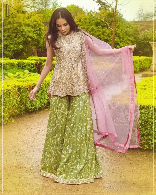 Wear this soft and supple hues richly decorated by shade pink with zardozi embroidered motifs and floral bootis all over