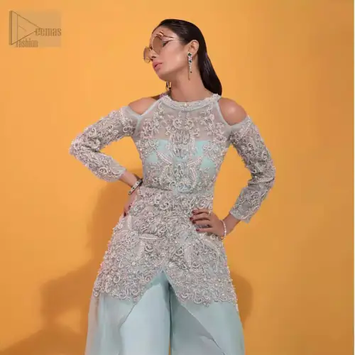 A fashion forward style statement that is contemporary yet chic. This handcrafted remarkable ensemble includes art deco design elements. Unique