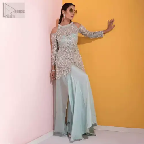 A fashion forward style statement that is contemporary yet chic. This handcrafted remarkable ensemble includes art deco design elements. Unique