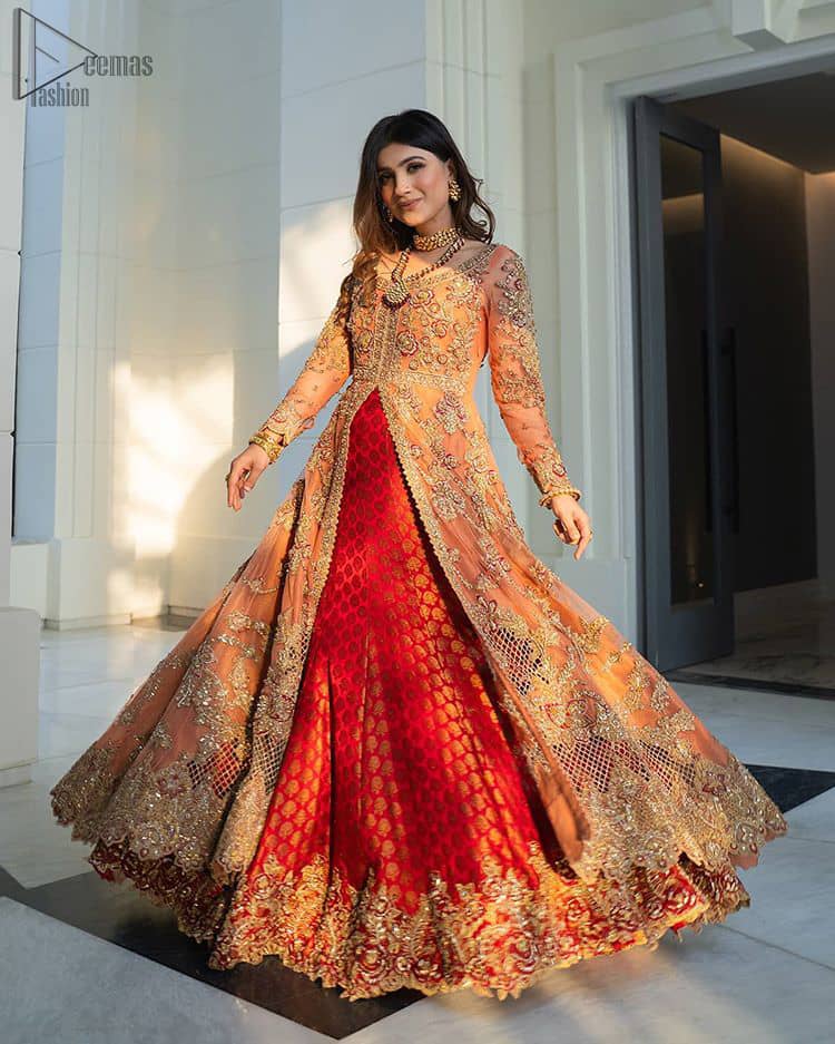 Details make perfection and perfection is not a detail”-DaVinci. This beautiful quote embodies what the DeemasFashion tries to achieve in its every ensemble which is customised to perfection. This beautiful play of red and orange makes for a stunning. The upper layer of maxi is beautifully crafted with multiple color zardozi work and embroidered jaal. The bottom of inner are even more enhanced with golden zardozi embellishment and finished with scallops. It comprises with churidar pajama and fawn chiffon dupatta. The embellished alluring cut work floral border gives the perfect ending to veil or dupatta.