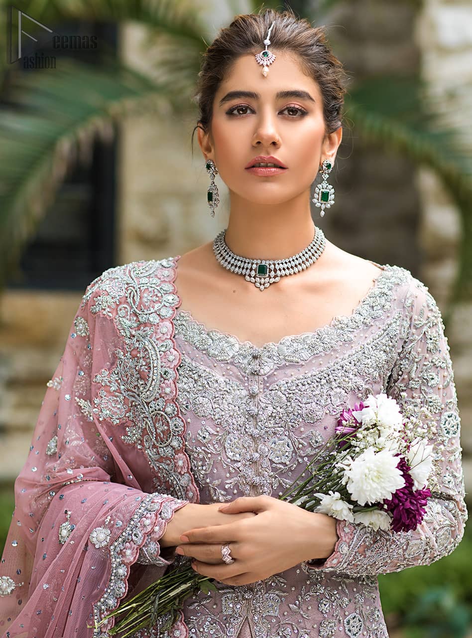 Pink Front Open Gown - Ruffled Sharara - The gown is beautifully sculptured with floral embroidery, adorned with intricately embellished borders with silver kora, Dabka, pearl and sequins work all over.