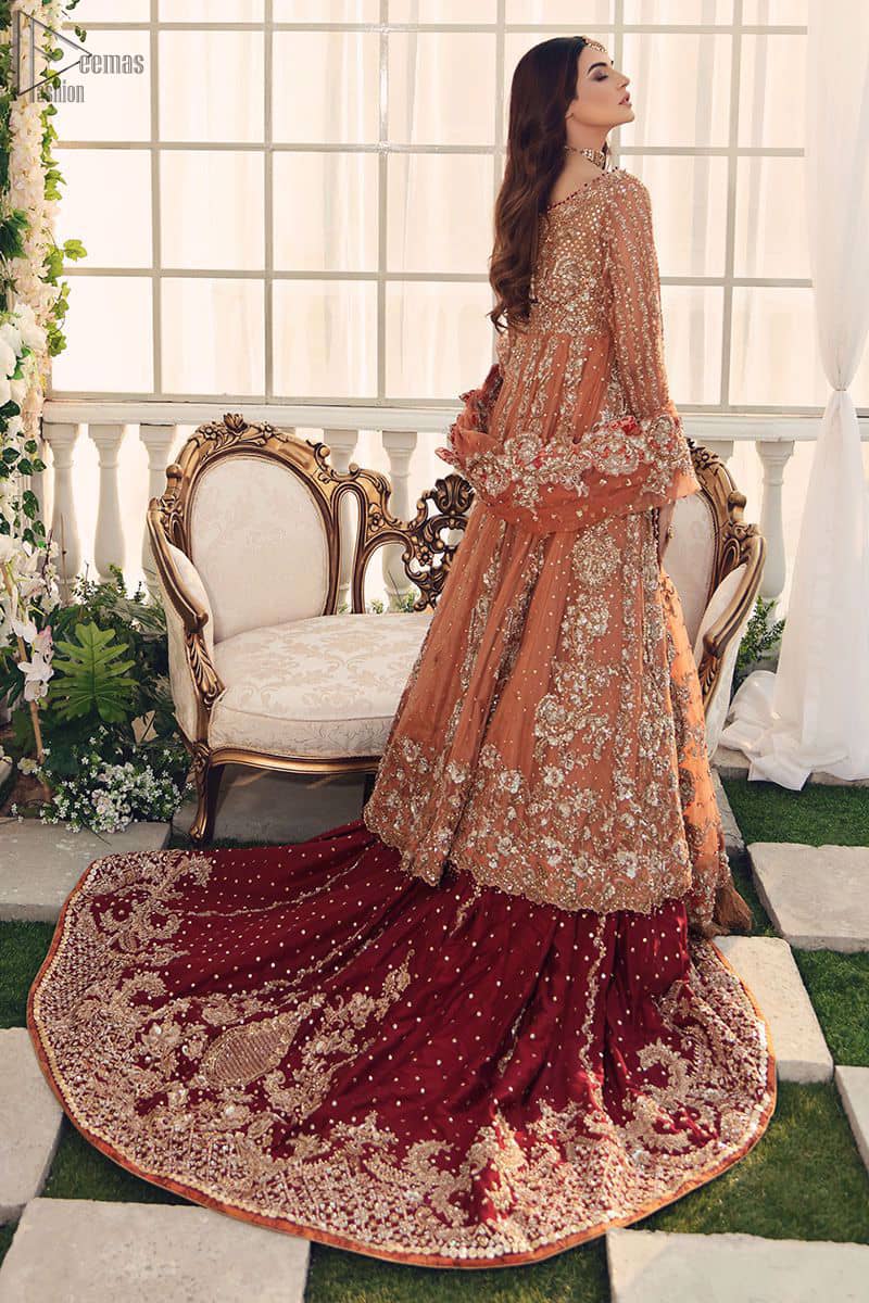 Pakistani Bridal Wear Salmon Front Open Gown - Maroon Back Train Lehenga - This fairytale ensemble is everything that you need to impress everyone. The maroon Lehenga is an example of remarkable handwork. With a lot of attention to detail, the intricate sequencing using sequins, kora, dabka, crystals beading, and threads makes the lehenga look like nothing but a dream. 