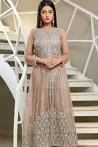 With pure fabric heavily embroidered with zardozi and the perfect blend of traditional flamboyance and modern elegance in design, you need to look no further for the perfect look for any formal occasion. The shirt is delicately crafted with silver zardozi work. The bodice is heavily laden with silver embellishment. Pair it up with tea rose palazzo pants scattered pearls on the bottom edge. The outfit is coordinated with net dupatta having kiran on all four sides.
