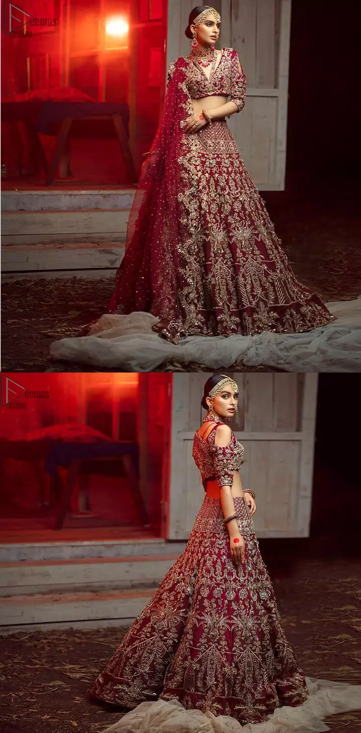 Maroon Pakistani bridal wear half blouse and lehenga comes with dupatta. Deep red half blouse choli along with same colour Lehenga of Organza Fabric with Golden-Ivory Embroidery is Everything. For a Bride planning, some exceptional outfit here comes the fully embellished, geometrical shapes having half sleeves for her Reception. The V-Neckline unifies the whole outfit with fully sprayed Tilla, Dabka work with floral motifs on Blouse Choli, Lehenga and Net Dupatta of Organza Fabric. The Lehenga has finished edges with full flare and fixed waist belt with a side zip closure along with dupatta of same deep red colour with heavy full embellished four borders.
