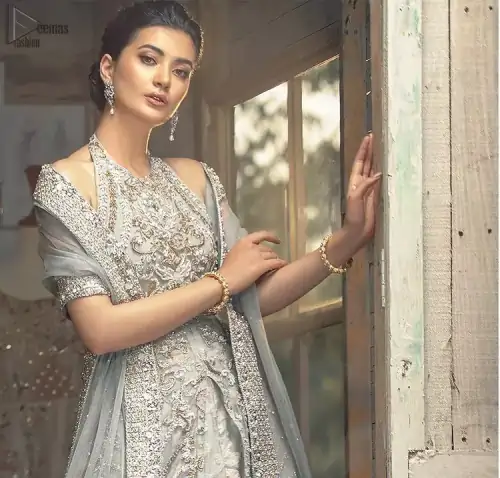Nikah Wear - Light Grey Halter Neck Gown Lehenga. The floral and the flowery climber networks on fully embellished Halter