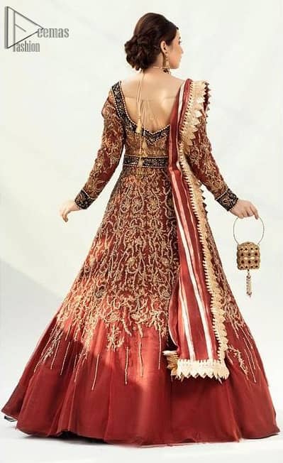 An exquisite full-sleeved gown followed by a marvellous churidar Pajama. This Maroon gown is made to perfection with splendid golden embroidery, beneath its beautiful sweetheart neckline. 