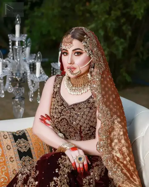 Perfect wear for all those looking for something bold yet beautiful. The Maroon Velvet Lehenga is an example of remarkable