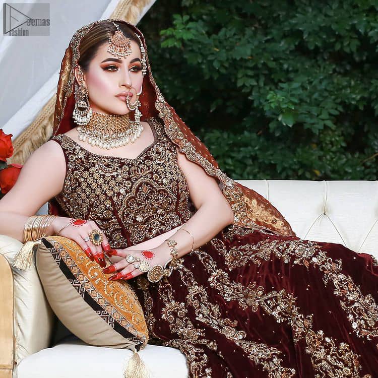 A dress so elegant would be your best choice for Nikkah or Walima ceremony. Maroon Velvet Lehenga Blouse and Copper Dupatta.
