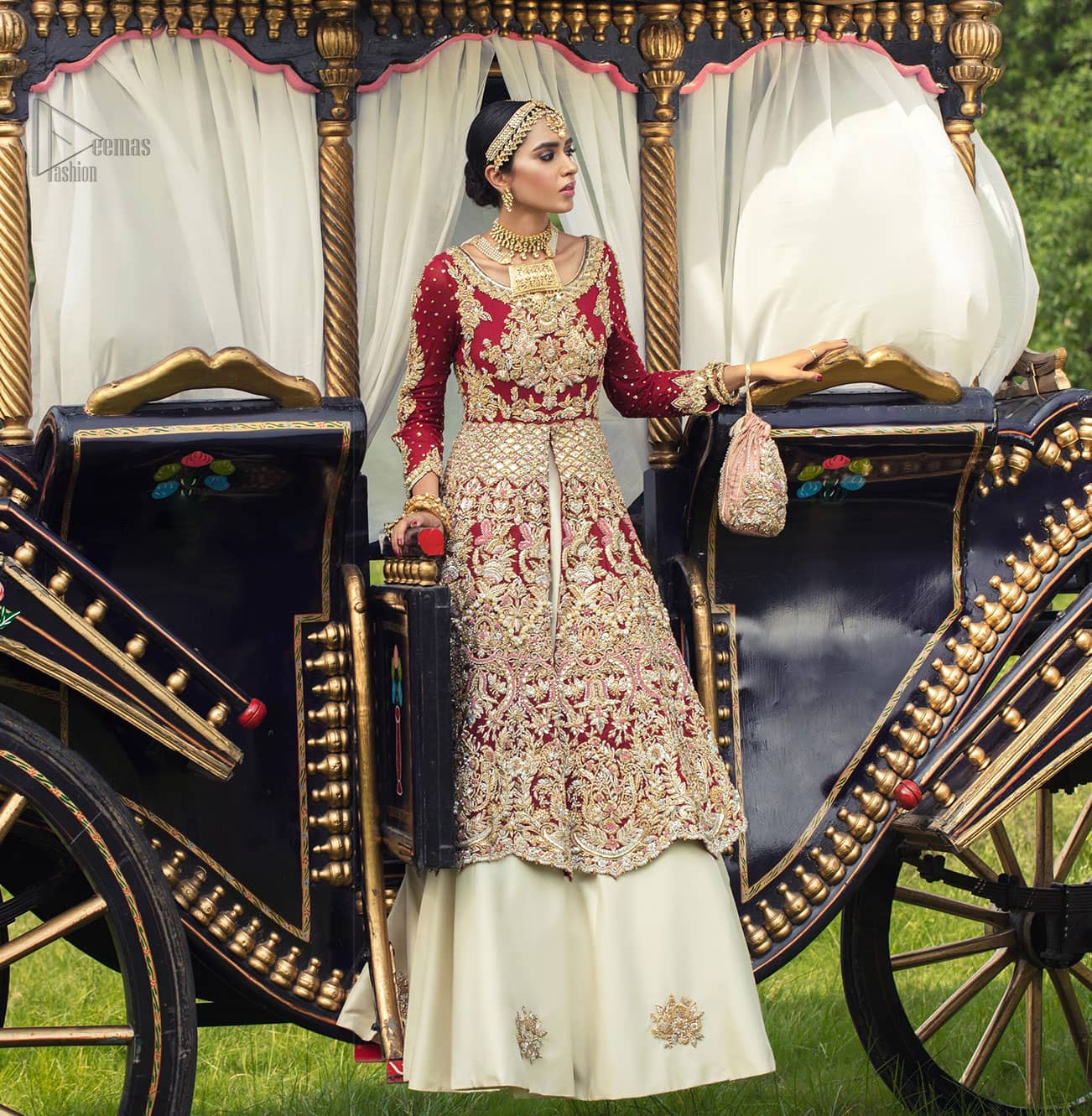 Best Nikah Dress - Red Front Open Gown Inner Ivory Lehenga Maxi. Glorify yourself by suiting up with the exceptional dress ranges from the house of DeemasFashion out of which one is here to make you graceful enough to make all jaws drop down. Red Organza with sweetheart necklined fully engraved, chantilly appliqued and giving a kind of look that you will surely love to have. Along with the elegant ivory coloured floral motifs having maxi lehenga in your drop-down menu of this gorgeous outfit. The fully embossed tea rose organza dupatta is giving major traditional vibes with scalloped borders that will surely suit your face beauty.