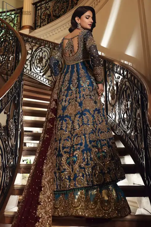 Style exquisitely with Teal Lehenga Pishwas on your Nikkah or Walima. The dress accompanies a fascinating Maroon dupatta.
