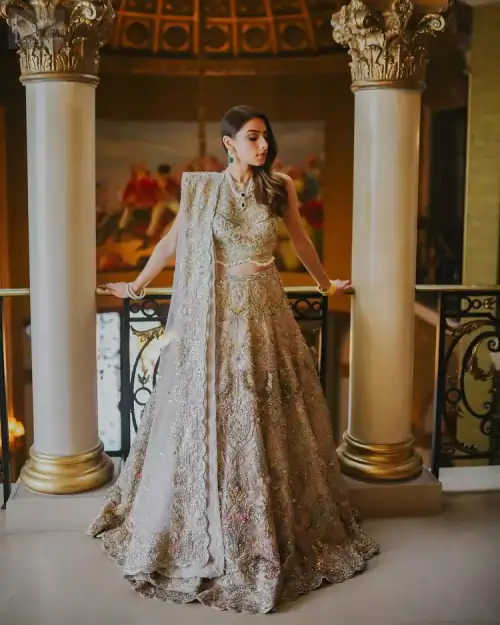 Introducing the sleeveless beauty, the Lilac Lehenga Blouse, fascinating bridal wear that guarantees a queenly look.