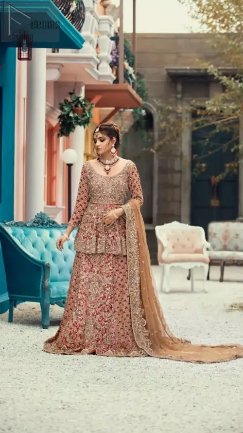 Red Peplum and Lehenga with Rust Net Dupatta. It features a highly remarkable back train and is decorated with fascinating