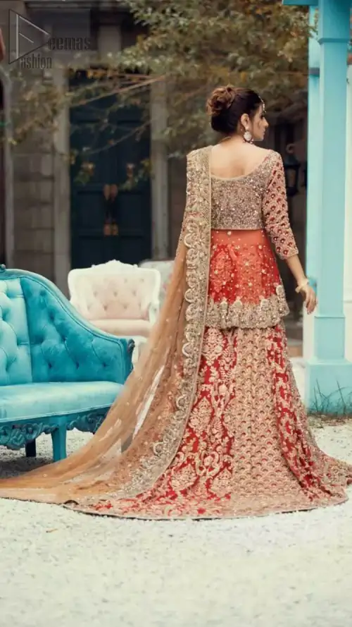 Red Peplum and Lehenga with Rust Net Dupatta. It features a highly remarkable back train and is decorated with fascinating