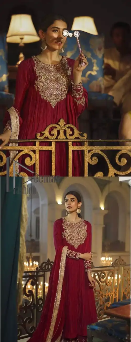 A picture of pure elegance with maroon crushed frock enhanced with embellished golden embroidered neckline. The neckline is adorned with