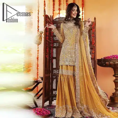 The shirt is the mirror of the mind and the dupatta confesses secrets of the heart. This mustard soft-toned article