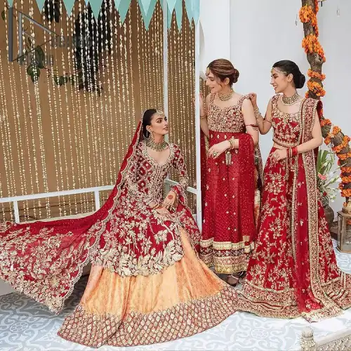 The majestic red signs a melody just for you. The handsome scalloped frock is made in the richest shade of