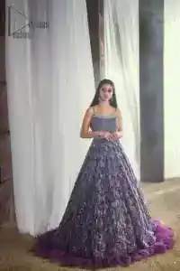 Style with an unparalleled ravishing, by picking the right dress for you. Evening parties of Walima being full of entertainment are maxed up with gratification if your dress wins you the most admirers. This sleeveless Purple Frilled Maxi has the magical features to make you an evening star. Decorated with silver embroidery, its stunning square neckline suits its highly enchanting silver embroidery. This Maxi is designed from 100% pure Organza Stuff that gives you artistic look at your event.