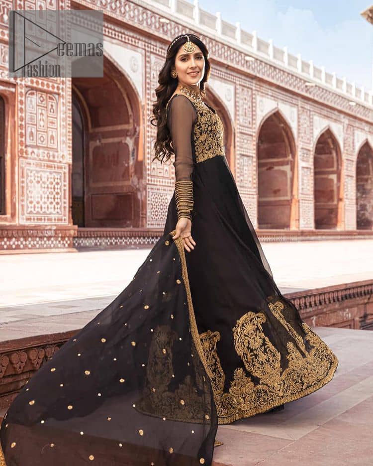 Black is just associated with a romantic evening. To make your event super dazzling and take a title of the start of the night so just go with our black can-can maxi. The body of the maxi is finished with golden embroidery which embraces golden tilla, dabka, kora and zardozi work. The full sleeves of the maxi added an astonishing vibe when paired up with the V shape neckline. Furthermore, the bottom line of the maxi is again embellished with heavy golden work. It is organized with a black dupatta which is embellished with four-sided borders and sequins sprayed all over.