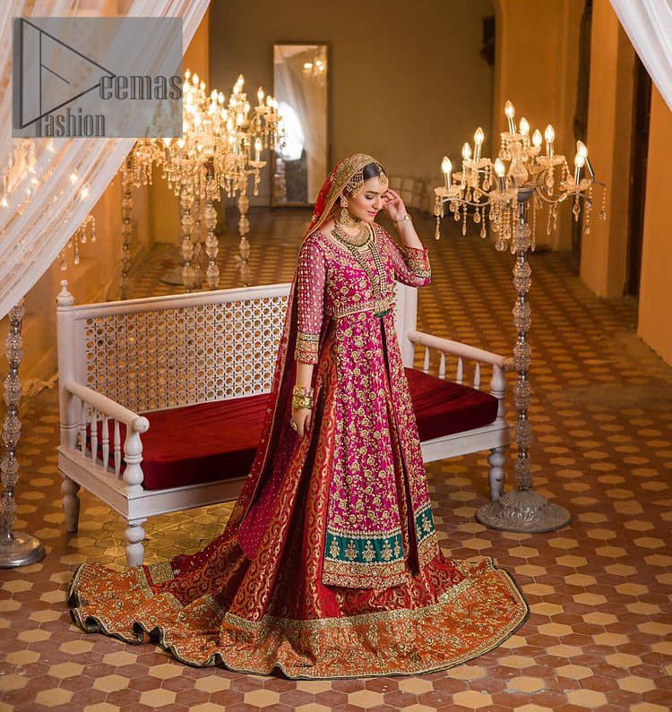 Do you also want to give you a look of the traditional brides on your Mehandi? Make your moment memorable being a queen in our magenta front open shirt with intricately embroidered neckline and embellished with delicate kora, dabka, tilla work all over. A green border of the shirt gives the perfect look to the outfit. It is organized with a red back train jamawar lehenga to give you the look of such a traditional bride. Complete this outfit with a red dupatta which is laboriously adorned with a four-sided border and ting floral motifs all over to give you such a super traditional Mehandi bride vibe.