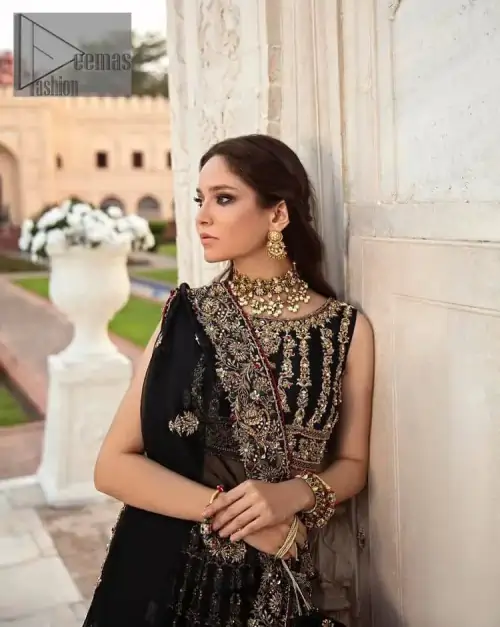 Black is the second way to show romanticness. This black article is attractively rendered with golden embroidery in which details